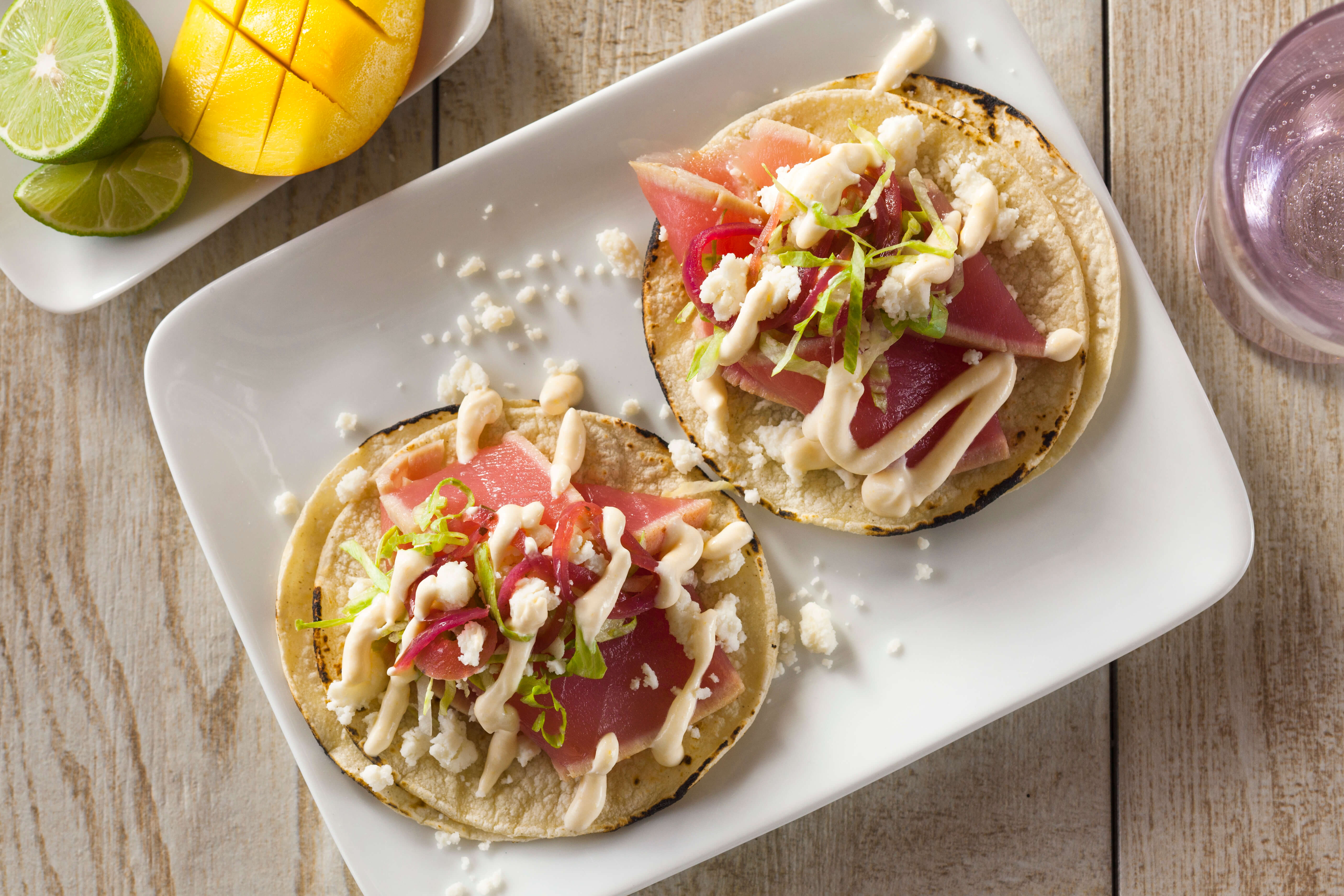 Seared Tuna Tacos with Mango-Lime Crema & Queso Fresco