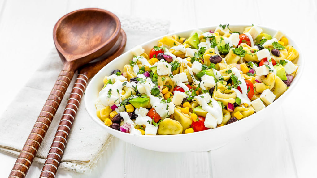 Mexican Tortellini Salad with Crema Dressing Cacique® Inc.
