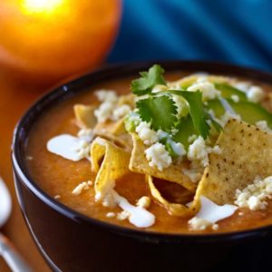 Savory Tortilla Soup with Crispy Tortillas, Queso Fresco & Crema