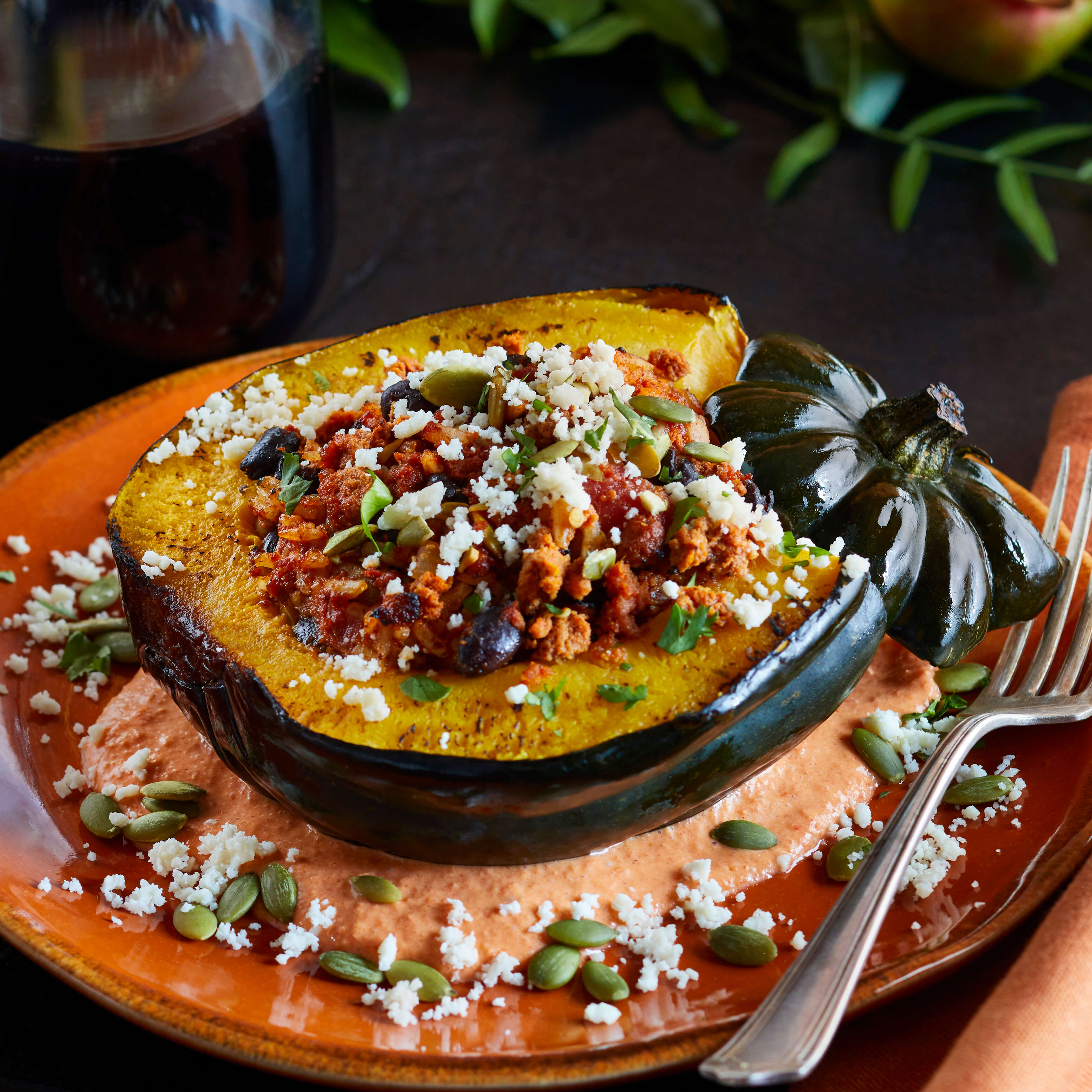 Whole-Roasted Acorn Squash With Chorizo And Red Pepper Crema