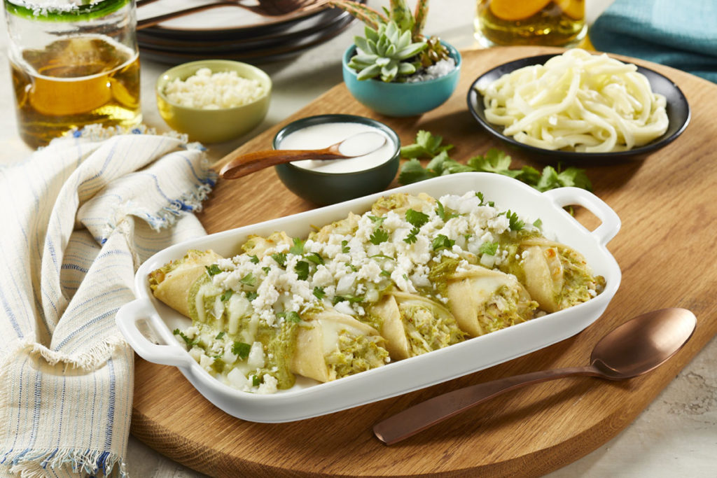 Enchiladas Suizas with Oaxaca, Queso Fresco & Chicken Cacique® Inc.