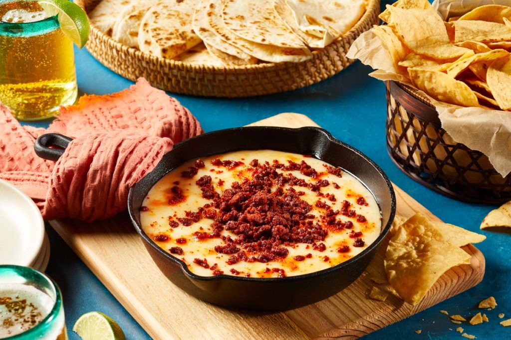 Queso Fundido with Oaxaca and Chorizo Cacique® Inc.