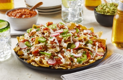 photo of Cacique Cheesy Chorizo Fries plate
